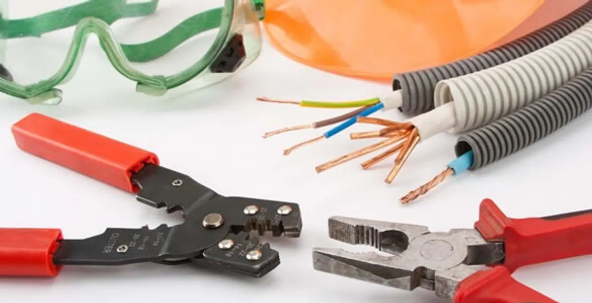 Electrical wiring repair with professional tools and safety equipment in Chandler, IN