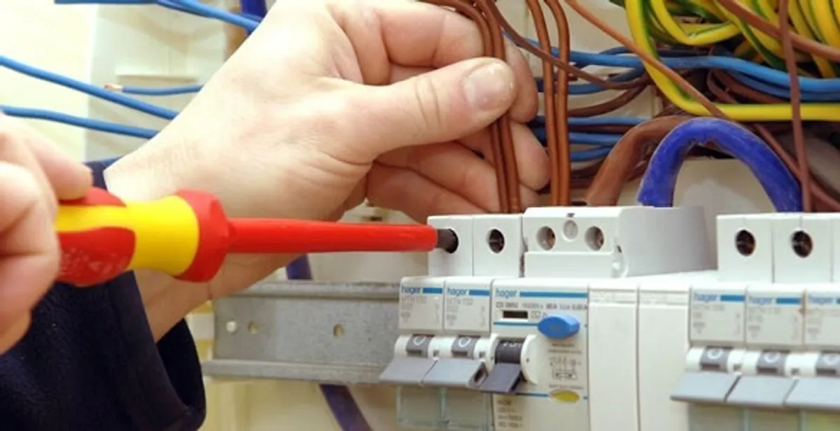 electrician services performing professional electrical panel wiring and connections in Evansville, IN
