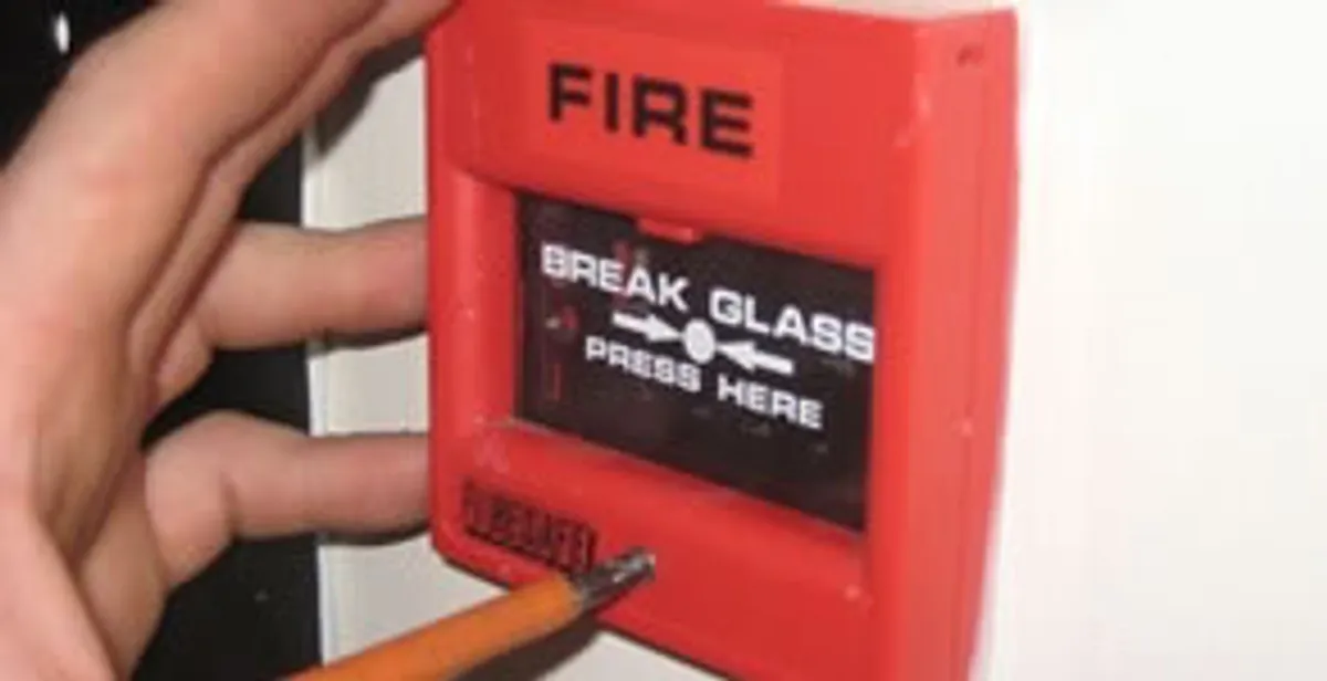 fire alarm installation service showing manual fire alarm pull station installed by licensed electricians in Evansville, IN