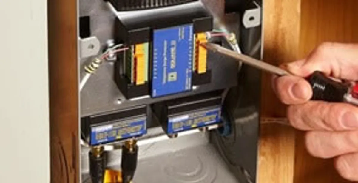 Whole home surge protection device being installed by a licensed electrician to protect electrical systems in Evansville, IN
